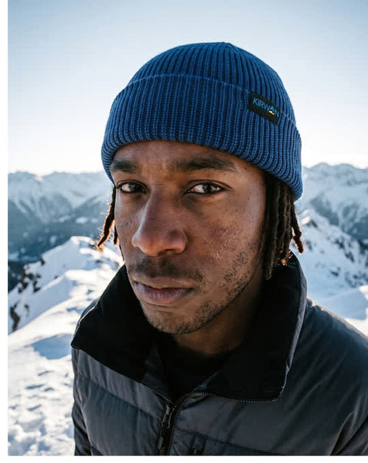 Merino beanie worn by rider on snow
